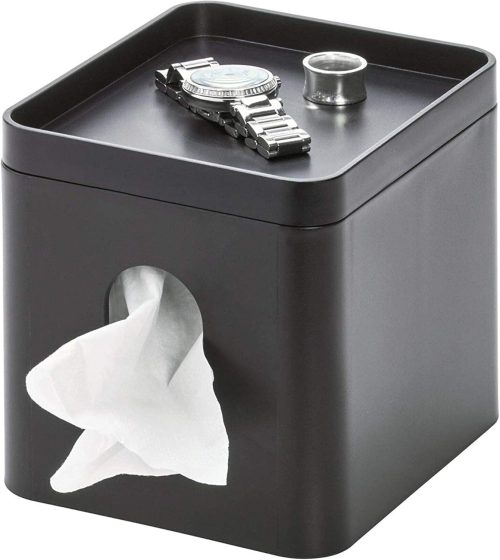 iDesign Facial Tissue Box Cover Holding a watch on its Storage Tray and tissue on the side hole.